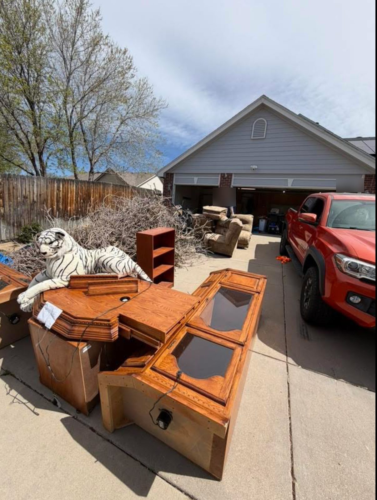 Before — Driveway furniture cleanout — loaded and gone